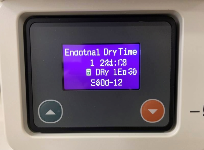 A freeze dryer control panel showing additional dry time being added to a cycle